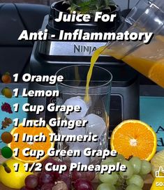 an orange juice is being poured into a blender and surrounded by grapes, lemons, grapefruit, and pineapple