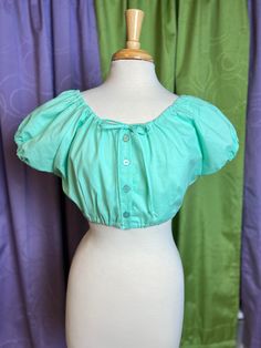 *PRE ORDER ITEM*All orders placed the week of April 26-May 2nd will be made and shipped out after I get back from Viva Las Vegas Rockabilly Weekender. Lou Lou Dolls your going to love our 1940s inspired cropped peasant blouse we are calling Mary. The Mary blouse can be worn off the shoulders as well. Made of 100% quality cotton. Buttons down the middle. Bust: XS 31-32" S 33-34" M 35-36" L 37-38" XL 39-40" 1X 42-43" 2X 45-46" 3X 48-49" Waist: S 26-27" M 28-29" L 30-31" XL 32-33" 1X 34-36" 2X 37-3 Viva Las Vegas Rockabilly Weekend, Viva Las Vegas Rockabilly, Lou Lou, April 26, Peasant Blouse, Girls Dream, Seafoam Green, Soft Girl, Cottage Core