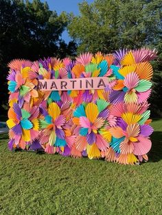 colorful paper flowers decorate the entrance to martina