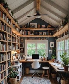 a home office with lots of bookshelves and plants