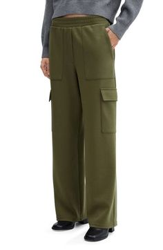 Slip into streetwear style with these roomy, stretchy cargo pants topped with an elastic waistband. Elastic waist Front slant pockets; cargo flap-patch pockets 83% polyester, 13% viscose, 4% elastane Machine wash, line dry Imported Wide Leg Sweatpants With Pockets For Work, Utility Cargo Jeans With Elastic Waistband For Workwear, Green Cargo Pants With Patch Pockets For Fall, Khaki Utility Cargo Sweatpants, Khaki Utility Cargo Style Sweatpants, Wide-leg Cargo Pants With Side Pockets For Fall, Fall Wide-leg Cargo Pants With Side Pockets, High-waisted Cargo Pants With Patch Pockets For Fall, Wide-leg Pants With Flap Pockets For Fall