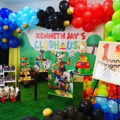 mickey mouse themed birthday party with balloons and decorations