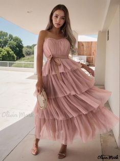 Olivia Mark - Luxurious Party Wear Maxi Gown Boasting Tulle Ruffles and Adjustable Strap Party Gown With Tulle Ruffled Skirt, Strapless Ruffle Gown For Banquet, Strapless Gown With Ruffles For Banquet, Ruffled Maxi Dress For Banquet In Prom Season, Tiered Maxi Dress For Prom Season, Sleeveless Gown With Ruffles For Party Season, Sleeveless Ruffled Gown For Party Season, Summer Ruffled Gown For Banquet, Pink Tiered Gown For Party