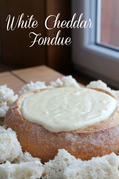 white cheddar fondue in a bread bowl