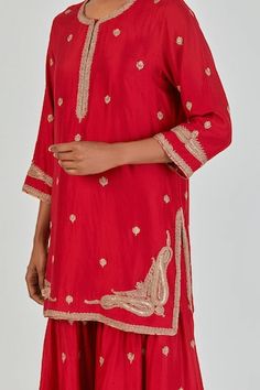 Red three fourth sleeves A-line silk kurta with wild floweret Marodi buta embroidery using gold zari thread work detailing. Paired with a matching palazzo. - Aza Fashions Red Blouse With Dupatta For Eid, Elegant Red Straight Kurta Traditional Wear, Elegant Red Silk Palazzo Set, Designer Festive Sets With Gota Work, Red Festive Blouse For Eid, Fitted Red Long Sleeve Palazzo Set, Elegant Ceremonial Sets With Gota Work, Designer Sets With Gota Work For Festivals, Elegant Red Palazzo Set With Chikankari Embroidery