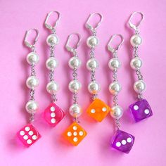 For the classy gal, who likes to play. Transparent acrylic dice with Pearl Details. *Sterling Silver Plated *Sterling Silver Earring Post *Handmade in LA Hex Nut Jewelry, Dice Earrings, Wire Earrings Handmade, Pearl Earrings Handmade, Safety Pin Jewelry, Beaded Jewelry Earrings, Stick Earrings, Pearl Details, Spring Earrings