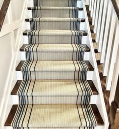 an image of a staircase with carpet on it