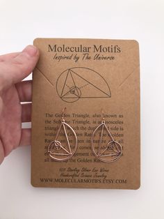 These earrings make a great gift and statement piece for math lovers, architects, teachers or anyone Golden! Modeled after the Golden Ratio, they are a symbol of perfection. 🔬For other science themed jewelry, please check out my main shop page www.etsy.com/shop/molecularmotifs ✦DETAILS✦ *Earrings are lightweight but sturdy and measure 1 inch(2.45cm) I designed the earrings to be LIGHTWEIGHT so they don't weigh down your ears BUT they are VERY STURDY and cannot bend in your hand unless you're in Geometry Earrings, Stem Jewelry, Physics Jewelry, Science Earrings, Math Earrings, Math Jewelry, Math Gift, Science Jewelry, Thanks For The Gift