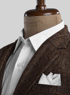 If you're looking for a sophisticated jacket as well as you want to appear chic and polished then our Harris Tweed Dark Brown Herringbone jacket will be a perfect pick for a modernized spin. Crafted from pure wool, the jacket will give you extra fashion points as it exudes herringbone pattern, also called broken twill weave that adds a wow factor to the overall attire.   Look Includes  Harris Tweed Dark Brown Herringbone Fabric  Two Button Jacket Style  Notch Lapel  Real Horn Brown Buttons  Sing Dark Brown Suit, Extra Fashion, Herringbone Suit, Herringbone Jacket, Classic Menswear, Herringbone Fabric, Men Classic, Brown Suits, Twill Weave