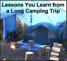 a tent is set up in the woods