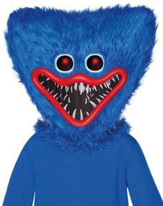 a blue stuffed animal with red eyes and teeth on it's face, wearing a hoodie