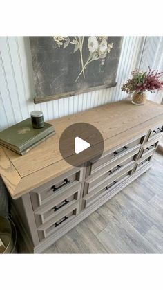 a large wooden dresser sitting on top of a hard wood floor