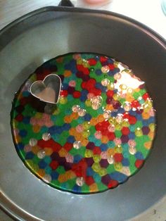 there is a cake in the pan with hearts on it