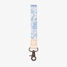 a blue and white strap with a metal hook