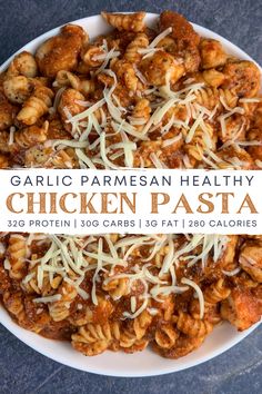 healthy garlic parmesan chicken pasta in a white bowl with the title above it