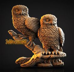 two carved owls sitting on top of a tree branch in front of a black background