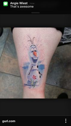 an image of a snowman tattoo on someone's leg with the words, that's awesome