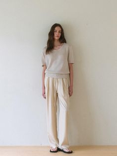 This is a minimal and modern pants by dankedir that is made out of high quality and sturdy material. With distinctive mood of the design and comfortable wear, you can style it for your clean daily outfit.- Semi wide silhouette- Subtle gloss of light fabric- Adjustable strap on the waist- Trendy and feminine mood Casual Beige Viscose Bottoms, Beige Viscose Pants For Spring, Spring Beige Viscose Pants, Beige Wide Leg Pants For Daywear, Casual Loungewear Pants With Minimal Stretch, Beige Viscose Bottoms For Summer, Relaxed Fit Viscose Pants For Loungewear, Viscose Long Pants For Daywear, Beige Viscose Summer Bottoms