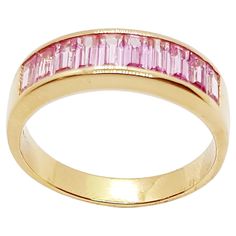 Pink Sapphire 1.38 carats Ring set in 18 Karat Rose Gold Settings Width: 1.8 cm Length: 0.6 cm Ring Size: 54 Total Weight: 4.14 grams "We first opened doors in 1980 when it was then situated in the vicinity of the Victory Monument; a small and modest storefront with a couple of counters. From its humble beginnings to where it stands today, our company has proven its abilities as a jeweler. Since the beginning, we have been supplying fine quality pieces to dealers, wholesalers and customers worldwide. From then till now, our business still interrelates its name with quality products and excellent service, where commitment and sincerity toward customers will always be its motto." Classic Pink Ring With Polished Finish, Formal Pink Rings With Polished Finish, Pink Rings With Polished Finish Fine Jewelry, Fine Jewelry Pink Rings With Polished Finish, Formal Pink Gold Rings With Pink Sapphire, Pink Baguette Cut Diamond Ring For Formal Events, Classic Yellow Gold Diamond Ring With Pink Sapphire, Anniversary Pink Sapphire Baguette Cut Ring, Pink Baguette Cut Diamond Ring For Anniversary