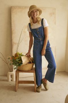 Grace Jumpsuit in Dark Denim · Whimsy & Row ~ Sustainable Clothing & Lifestyle Brand Utility Straight Leg Jumpsuits For Workwear, Utility Workwear Jumpsuit With Straight Leg, Utility Style Workwear Jumpsuits With Straight Leg, Medium Wash Relaxed Fit Denim Jumpsuit With Bib Front, Dark Wash Utility Denim Jumpsuit With Bib Front, Utility Style Dark Wash Denim Jumpsuit With Bib Front, Utility Overalls With Button Closure And Relaxed Fit, Straight Leg Overalls With Button Closure For Workwear, High Rise Cotton Jumpsuits And Rompers In Dark Wash