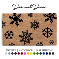 a door mat with snowflakes on it and the words, any size / color fast