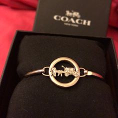 Coach Bracelet Still In Original Box Never Worn Other Than To Try On & Tag Was Taken Off Thinking I Would Keep It But Have Not Taken It Out Of The Box! Reasonable Offers Will Be Considered! Coach Adjustable Bangle, Adjustable Coach Bangle, Classic Coach Bangle Jewelry, Coach Classic Bangle Jewelry, Coach Bracelets As Gift, Coach Classic Bangle, Coach Metal Bracelet Jewelry, Coach Metal Bangle Jewelry, Coach Formal Bracelet Jewelry