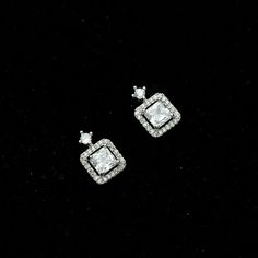 Shine like a star with our Silver Crystal Square Cubic Zirconia Earrings. Expertly crafted, these affordable earrings add elegance to any outfit. Hypoallergenic Cubic Zirconia Party Earrings, Hypoallergenic Cubic Zirconia Earrings For Party, Nickel Free Cubic Zirconia Earrings For Anniversary, Sparkling Cubic Zirconia Crystal Earrings, Hypoallergenic Cubic Zirconia Earrings In Diamond White, Hypoallergenic Diamond White Cubic Zirconia Earrings, Classic Silver Square Cut Earrings, Nickel-free Cubic Zirconia Earrings For Anniversary, Nickel-free Cubic Zirconia Elegant Earrings