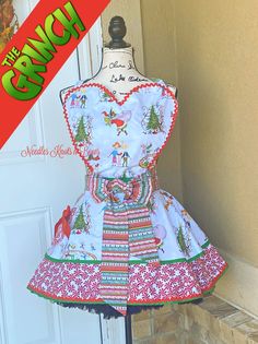 Grinch Christmas apron for women Grinch Apron, Candy Cane Themed Christmas, Dance Around The Kitchen, Flirty Aprons, Flirty Style, Smash Cake Girl, Apron For Women, Smash Cake Boy, Christmas Apron