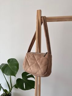 Everyday Quilted Hobo Shoulder Bag, Everyday Quilted Brown Shoulder Bag, Everyday Brown Quilted Shoulder Bag, Brown Quilted Shoulder Bag, Beige Quilted Shoulder Bag For Daily Use, Trendy Quilted Brown Bag, Rectangular Shoulder Bag With Soft Interior For Everyday, Everyday Rectangular Shoulder Bag With Soft Interior, Everyday Quilted Pouch Bag