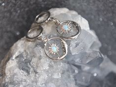 Silver Opal Earrings, Silver Moon Earrings, Silver Hoop Earrings, Celestial Earrings, Birthday Gift, Gift for Her These out of this world celestial crescent moons feature tiny cubic zirconia and opal starburst charms. For added sparkled the silver opal stars are framed with tiny cubic zirconia and small glowing synthetic opal stones. These cosmic earrings are the perfect gift for someone graduating, a best friend, celestial wedding or something special just for you! All of my jewelry arrives sui Hypoallergenic Celestial Round Earrings, Celestial Small Hoop Nickel-free Jewelry, Celestial Style Small Hoop Nickel-free Jewelry, Celestial Metal Hoop Earrings Gift, Celestial Silver Dangle Hoop Earrings, Celestial Hoop Jewelry As Gift, Celestial Silver Round Hoop Earrings, Silver Celestial Hoop Earrings, Celestial Hoop Earrings Gift