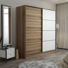 a bedroom with a bed, dresser and mirror