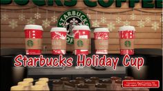 starbucks holiday cups are lined up in front of the starbucks sign