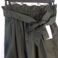 The Shirt Is High Waisted With Elastic Waist 12 Inches Stretches To 28 And Pockets. Its 28 Inches Long. Nwt Olive Green Green Non-stretch Skirt With Elastic Waistband, Uniqlo Skirt, Uniqlo Women, The Shirt, Women Skirts Midi, Uniqlo, Olive Green, Elastic Waist, Womens Skirt