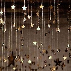 some gold stars hanging from the ceiling