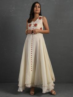 A double-layered umbrella cut front open Chanderi kurta with all-over floral buttis in yoke made using beads, sequins and silk French knots. Beadwork runs along the neckline and armhole. Contrast buttons and scalloped edges embroidered double layered flared hemline. The kurta comes with a delicate chanderi dupatta with all over sequence work and a wide woven zari border at the hem. Kurta measurements (in Inches): Size S: Bust - 38", Waist - 35", Length: 52" Size M: Bust - 40", Waist - 37", Lengt Sleeveless Kurta, Double Layer Dress, Layered Dress, Dupatta Set, Layer Dress, Indian Designer Wear, Embroidery Dress, Indian Design, Designer Wear