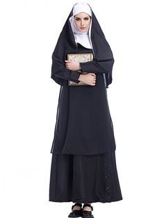 a woman wearing a nun outfit and holding a book in one hand while standing against a white background