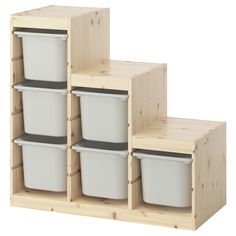 three wooden shelves with plastic containers stacked on top of each other and one is empty