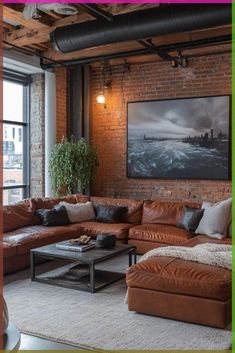 a living room filled with lots of furniture and a large painting hanging on the wall