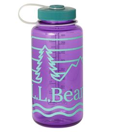 a purple water bottle with a blue lid