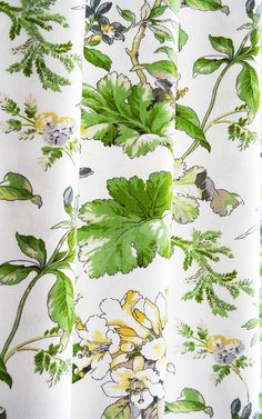 green leaves and flowers on white fabric