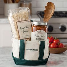 a kitchen counter with some bread and other food items in the bag on top of it