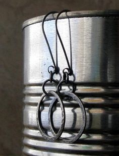 "These lightweight dangling hoop earrings have a nice rustic appeal with the antiqued silver finish. The Details ∞ Artisan handmade ∞ Lightweight dangling hoops (ring measures 7/8\" diameter) ∞ Total length 2 1/4\" ∞ Solid Sterling Silver ~ antiqued finish ∞ Made to order ∞ Gift box included ∞ Made in the USA VISIT OUR SHOP: http://www.PoseidonsBooty.etsy.com SHOP POLICIES: http://www.etsy.com/shop/PoseidonsBooty/policy" Oxidized Ring, Hoop Dangle Earrings, Hammered Ring, Lightweight Earrings, Light Weight Earrings, Antique Finish, Polish Jewelry, Handmade Artisan, Hoop Ring