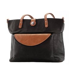 With its stylish, removable vegan leather clutch, the Everyday CarryAll is your everything bag - perfect for work, errands, travel or even date night! The versatile 2-bags-in-1, 4-ways-to-wear design makes this a perfect everyday bag or travel option. Elegant Tote Canvas Bag For On-the-go, Black Briefcase Tote With Detachable Handle, Black Tote Briefcase With Detachable Handle, Elegant Black Weekender Bag With Top Carry Handle, Elegant Black Weekender Bag With Removable Pouch, Black Diaper Bag With Adjustable Strap For Everyday Use, Modern Black Briefcase With Leather Handles, Elegant Rectangular Diaper Bag With Adjustable Strap, Modern Travel Canvas Bag With Detachable Handle