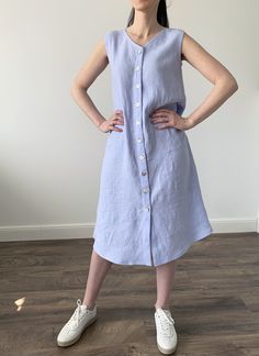 "Handmade MaTuTu Linen Style loose sleeveless washed linen dress with pockets, buttons and belt. The dress can be worn on two sides with the front or back fastening. *100% local medium weight linen *Suitable for maternity *Each item is individually cut and sewn by order *The model is wearing size S, dress color - Light blue *The model height is 168 cm *Note that colors may look different on your display depending on their settings and technical characteristics. Please let us know if you need dif Sleeveless Linen Dress With Buttons For Spring, Sleeveless Linen Dress With Buttons For Beach, Sleeveless Linen Dress With Button Closure, Sleeveless Linen Dress In Flax For Daywear, Sleeveless Linen Shirt Dress For Spring, Sleeveless Flax Linen Dress For Daywear, Sleeveless Linen Dress With Buttons For Daywear, Light Blue Sleeveless Dress With Buttons, Summer Sleeveless Dress