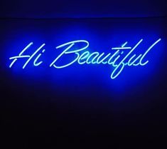 a blue neon sign that says hi beautiful