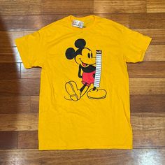 Brand New Mickey Mouse T-Shirt With Tags. Adult Size M New Mickey Mouse, Orange Tees, Mickey Mouse T Shirt, Yellow Orange, Orange Yellow, Tee Shirt, Tee Shirts, Mens Shirts, Man Shop