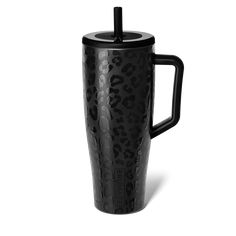 a black leopard print travel mug with a straw in the cup and lid is shown on a white background