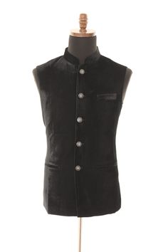 Introducing the Black Luxurious Velvet Nehru Men's Jacket, the perfect blend of sophistication and style for your next party or special occasion. This premium-quality jacket is crafted from rich, soft velvet fabric that offers a luxurious feel and drapes elegantly on your body. This Nehru jacket features a classic Nehru collar, and a buttoned front, adding a touch of traditional Indian style to your outfit. The beautiful Black color of the jacket exudes elegance and sophistication, making it an ideal choice for formal occasions such as weddings, formal events, and other special occasions. The Black Luxurious Velvet Nehru Men's Jacket is tailored to provide a comfortable, flattering fit, and is versatile enough to be paired with a variety of clothing items such as tailored pants, kurta paja Mandarin Collar Jacket, Mens Formal Vest, Nehru Jacket For Men, Formal Vest, Nehru Jackets, Mens Formal, Tailored Pants, Vest Outfits, Jacket Pattern