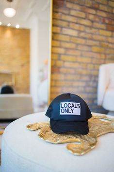 Locals Only! Black trucker hat with adjustable back. Comfortable and adjustable-one size fits all. The trucker hat style is so on-trend and super flattering. This hat is the perfect accessory for your next girl's trip! -100% polyester foam front, 100% nylon mesh back. -Adjustable snapback. Trendy Mesh Trucker Hat With Adjustable Fit, Trendy Adjustable Mesh Trucker Hat, Trendy Mesh Snapback Hat, Trendy Trucker Hat, 5-panel, One Size, Trendy Mesh Snapback Hat With Curved Bill, Trendy Mesh Snapback Hat With Curved Brim, Trendy Mesh Baseball Cap With Curved Bill, Trendy Mesh Trucker Hat For Streetwear, Adjustable Mesh Hat With Letter Print