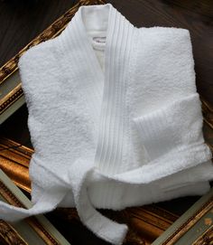 If you're looking for Peacock Alley's softest bathrobe, you've come to the right place. Our Bamboo Bathrobe, in our opinion, is the perfect robe to slip into after a warm shower or bath. 60% Rayon from bamboo / 40% Cotton Constructed with a terry loop for hanging and a corded dobby border detail. Imported from Portugal Dimensions Small/Medium Front chest width: 27"Sleeve length: 20"Length from shoulder: 44" Large/Extra Large Front chest width: 29"Sleeve length: 22"Length from shoulder: 48" Care White Long Sleeve Bathrobe, White Long Sleeve Bath Robe, Cozy White Robe For Relaxation, Peacock Alley, Sleepwear & Loungewear, Large White, Color Mixing, Men Sweater, Lounge Wear